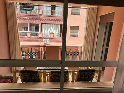 a view of a balcony from a window at Exceptionnel appartement a louer in Marrakech