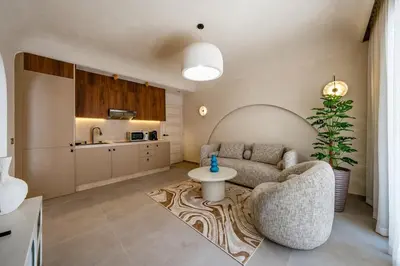a living room with a couch and a table at Modern Haven Guéliz, Netflix, Comfort in Marrakech
