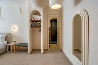 a room with a hallway with a mirror and a door at Modern Haven Guéliz, Netflix, Comfort in Marrakech