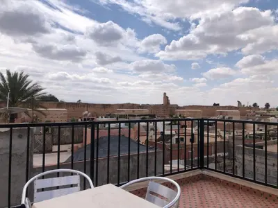 a balcony with a view of the city at Dar Daroune in Marrakech