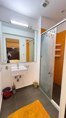 a bathroom with a sink and a shower at Apartment Ghita Cozy Stay in Central Marrakech in Marrakech