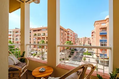 a balcony with a view of a city at Elegant and Confort Moderne au Coeur de la Ville in Marrakech