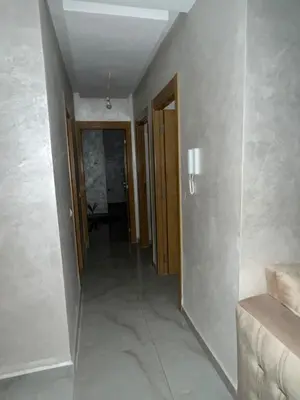 a hallway with a mirror in a room at Appartement Cosy Marrakech in Marrakech