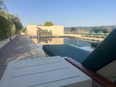 a view of a swimming pool from a house at M Résidence Marrakech Luxury Serviced Apartments in Marrakech