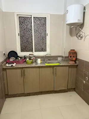 a kitchen with a sink and a window at Gueliz modern in Marrakech