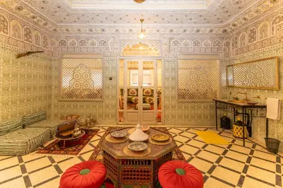 a living room with a couch and a table at Riad Hbibti Authentic Moroccan Stay with Rooftop Jacuzzi in Marrakech