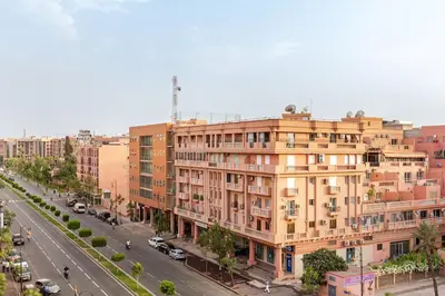 a large building on the side of a city street at Guéliz Marrakech-Authentique, spacieux , central in Marrakech