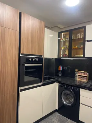 a kitchen with a washer and a washing machine at Apartment for rent in Marrakech