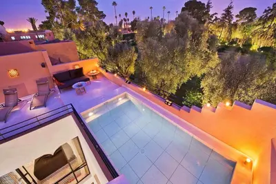 an overhead view of a swimming pool on a house at Riad la Source du Desert in Marrakech