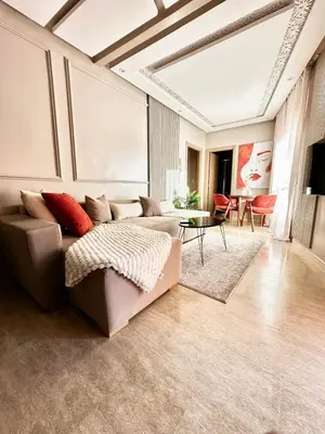 a living room with a couch and a table at Homekesh in Marrakech