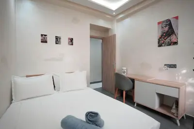a hotel room with a bed and a desk at Dar lalla in Marrakech