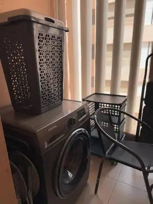 a washing machine with a tv on top of it at Near Gueliz 2 Bedrooms 3 ACs Fast WiFi Netflix in Marrakech