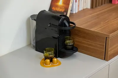 a coffee maker with two glasses on a counter at Atlas Dream Studio pool & parking included in Marrakech