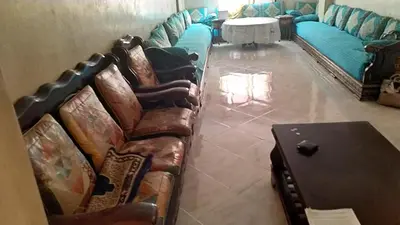 a living room with a couch and a table at Marrakech Allal El Fassi in Marrakech