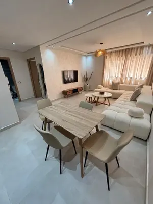 a living room with a table and a couch at Majorelle Retreat - Luxury Studio in Marrakech