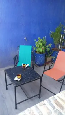 two chairs and a table on a patio at Cozy Flat near Gueliz in Center in Marrakech