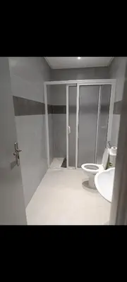 a bathroom with a toilet and a sink at Chambre Marrakech 4 in Marrakech