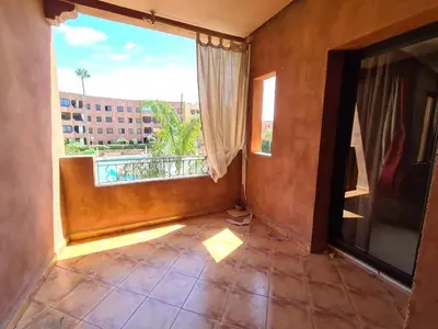 a room with a large window and a tile floor at Palm river marrackech in Marrakech
