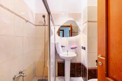 a bathroom with a sink and a shower at Guéliz Marrakech 2,central, spacieux, Authentique in Marrakech