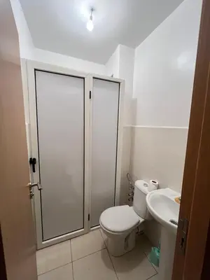 a bathroom with a toilet and a sink at Appartement Marrakech au 1er étage in Marrakech