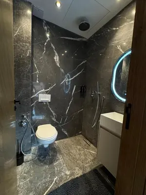 a bathroom with a toilet and a sink at Appartement Gueliz Elite garden in Marrakech