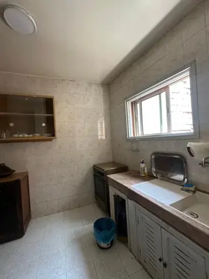 a small kitchen with a sink and a window at Appartement Layane Votre havre de paix à deux pas de Guéliz in Marrakech