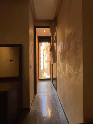 a hallway with a hallwayngth at Elite Garden Grand Studio Luxe in Marrakech