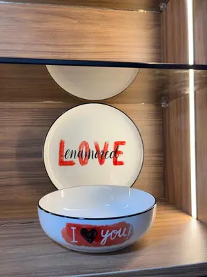 two bowls on a shelf with the words empowered i love you at Elite Garden Grand Studio Luxe in Marrakech