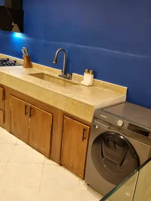 a kitchen with a sink and a washing machine at Entire Luxury Duplex Appart 3Bedroom 2Living Rooms in Top Center in Marrakech