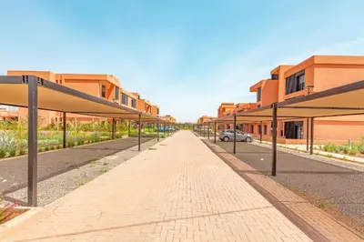 an empty street in front of a building at Noria Isli Dar Noor in Marrakech