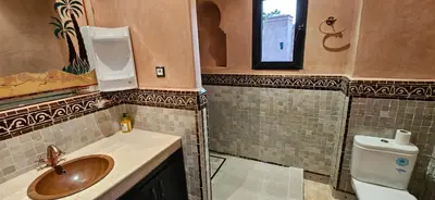 a bathroom with a sink and a toilet at Riad-Style Villa in Marrakech in Marrakech