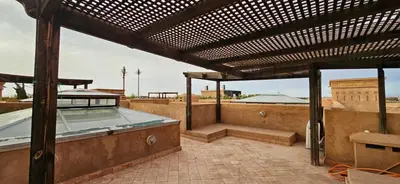 a hot tub on the roof of a building at Riad-Style Villa in Marrakech in Marrakech