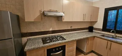 a kitchen with a stove and a counter top at Riad-Style Villa in Marrakech in Marrakech