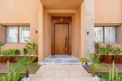 a front door of a house with plants at Villa Lina in Marrakech