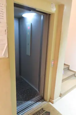 a glass door in a room with a hallway at Jassman2 in Marrakech