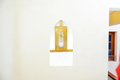 a lantern hanging on a wall in a room at Riad Palm and Pool 2 in Marrakech