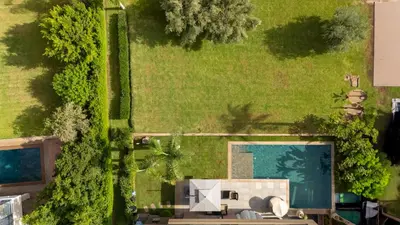an overhead view of a house with a pool at jacuzzi, 2 pools, luxury villa in Marrakech