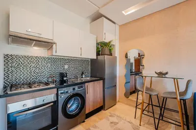 a kitchen with a sink and a dishwasher at Luxury Stay - Prestigia Golf City-3min - Airport in Marrakech