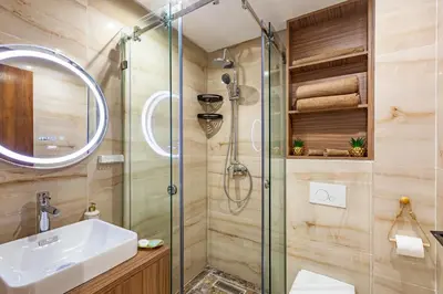 a bathroom with a shower and a sink at Studio Haut de Gamme in Marrakech