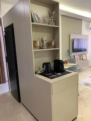 a kitchen with a counter and a stove in a room at Nejma House - 1 BR with pool in Marrakech