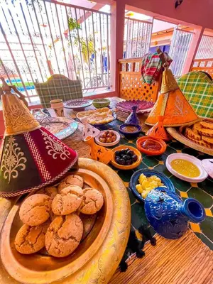 a table topped with plates of food on top at FERME D'HOTES BARGHALi in Marrakech