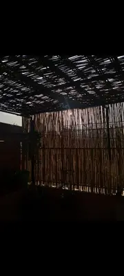 a room with a ceiling with a bunch of cords at Riad 05 in Marrakech