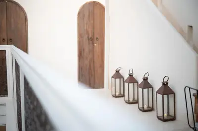 a row of lanterns on a stairway at Riad Dar Mimi in Marrakech