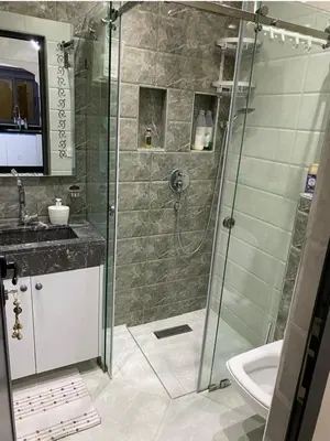 a bathroom with a shower and a sink at Séjour agréable à marrakech in Marrakech