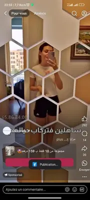 a man taking a picture of himself in a mirror at Nnyhh in Marrakech