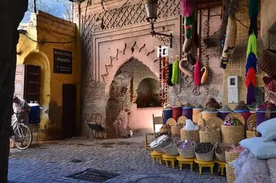 a store with baskets on display in a building at Riad Yalulen in Marrakech