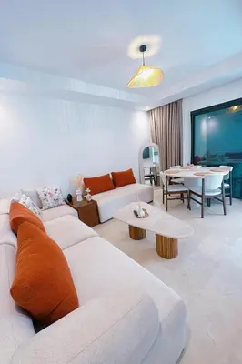 a living room with a couch and a table at Havre de paix 2 chambres a Noria & transfert in Marrakech