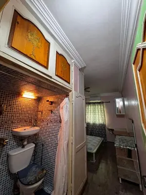 a small bathroom with a sink and a toilet at Appartement a louer a massira 3 marrakech in Marrakech