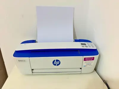 a hp printer sitting on top of a table at Trésor de Gueliz avec Piscine et Terrasse in Marrakech