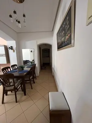 a dining room with a table and chairs at Elegant apartment in the heart of Gueliz in Marrakech